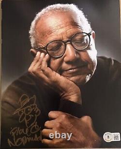 Floyd Norman? Autographed? Signed 8x10 Color photo Beckett Disney Animator