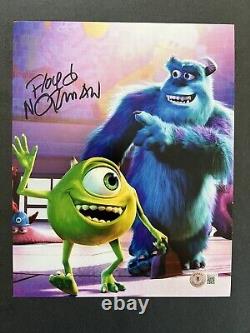 Floyd Norman autographed signed 8x10 photo Beckett BAS COA Disney Monsters Inc